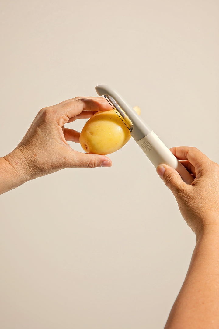 UPCYCLE SWIVEL PEELER - GREY