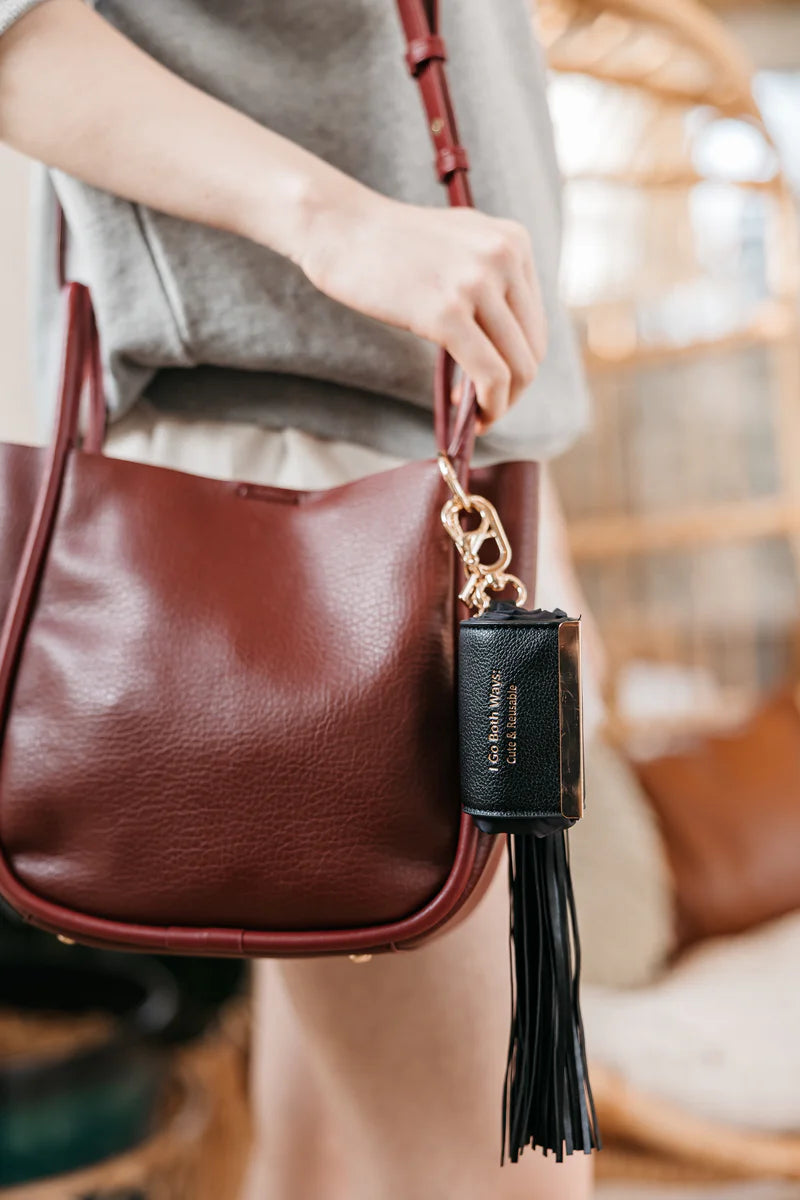 FAUX LEATHER TASSEL IN BLACK