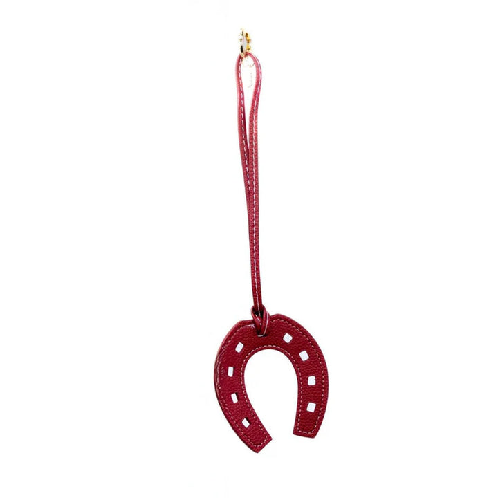 FAUX LEATHER HORSE SHOE CHARM IN BURGUNDY