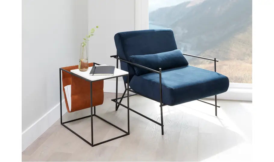 CAVE MAGAZINE RACK