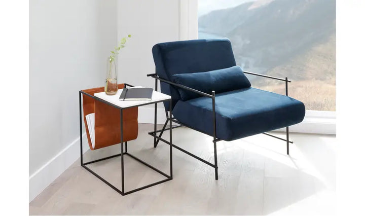 CAVE MAGAZINE RACK