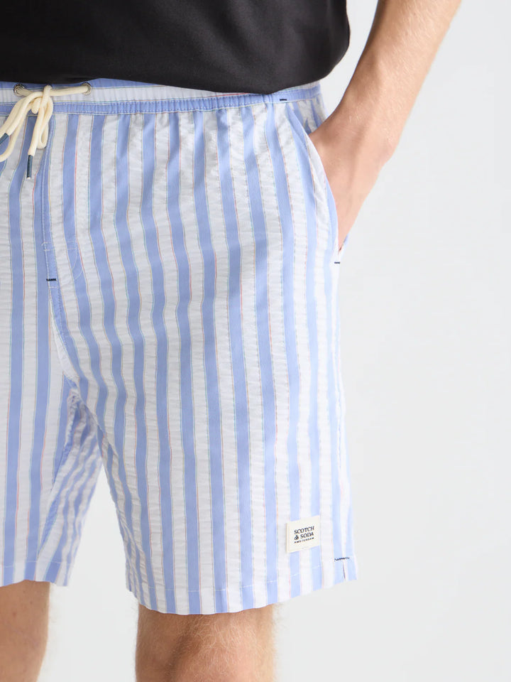 STRIPED MID-LENGTH SWIM SHORTS "CLASSIC STRIPE INFINITY"