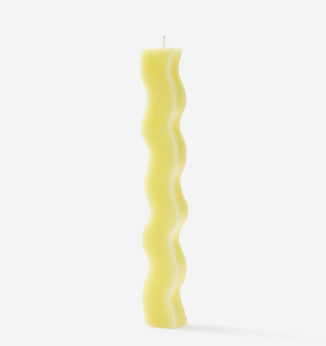 YELLOW WAVE TAPER CANDLE
