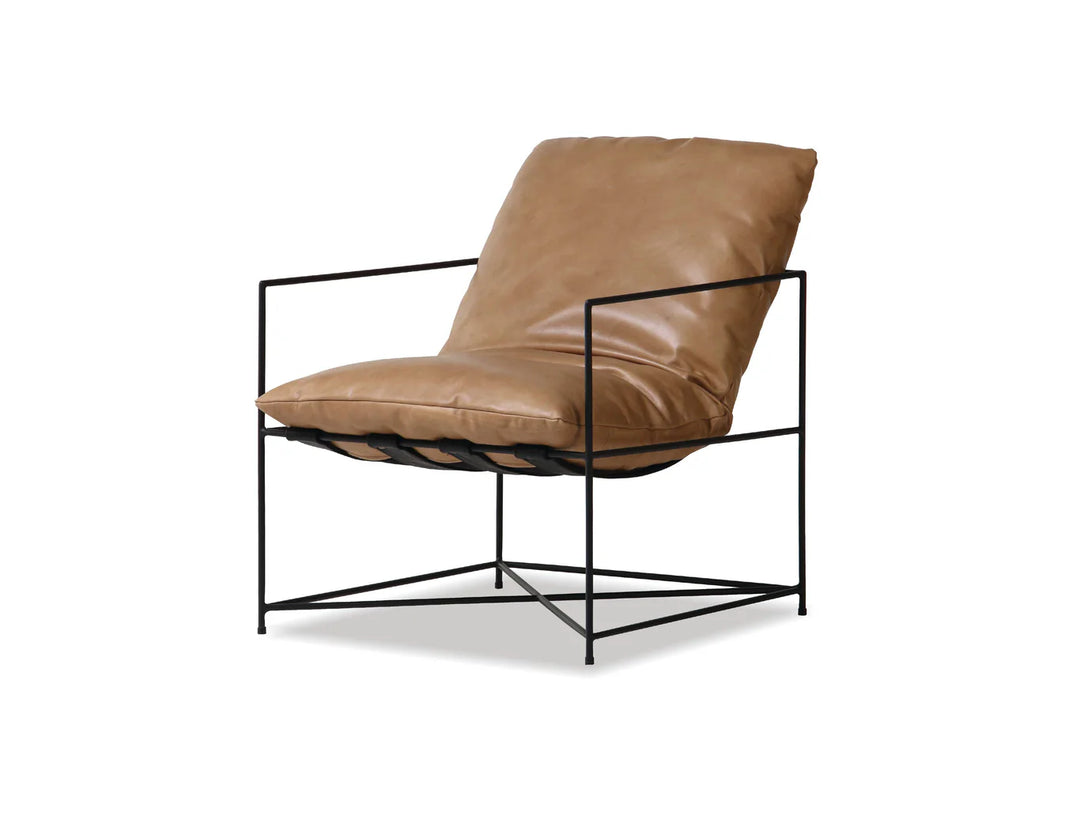 VINTAGE LEATHER ERICSSON LOUNGE CHAIR IN TAN - BLACK PC LEGS