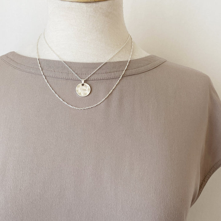 Caracol Double Chain Necklace With Hammered Round Pendant